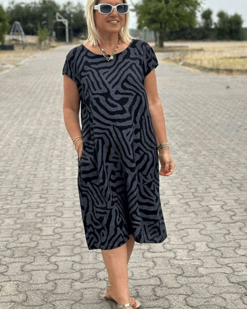 Nelia™ | Summer dress with round neckline and beautiful print