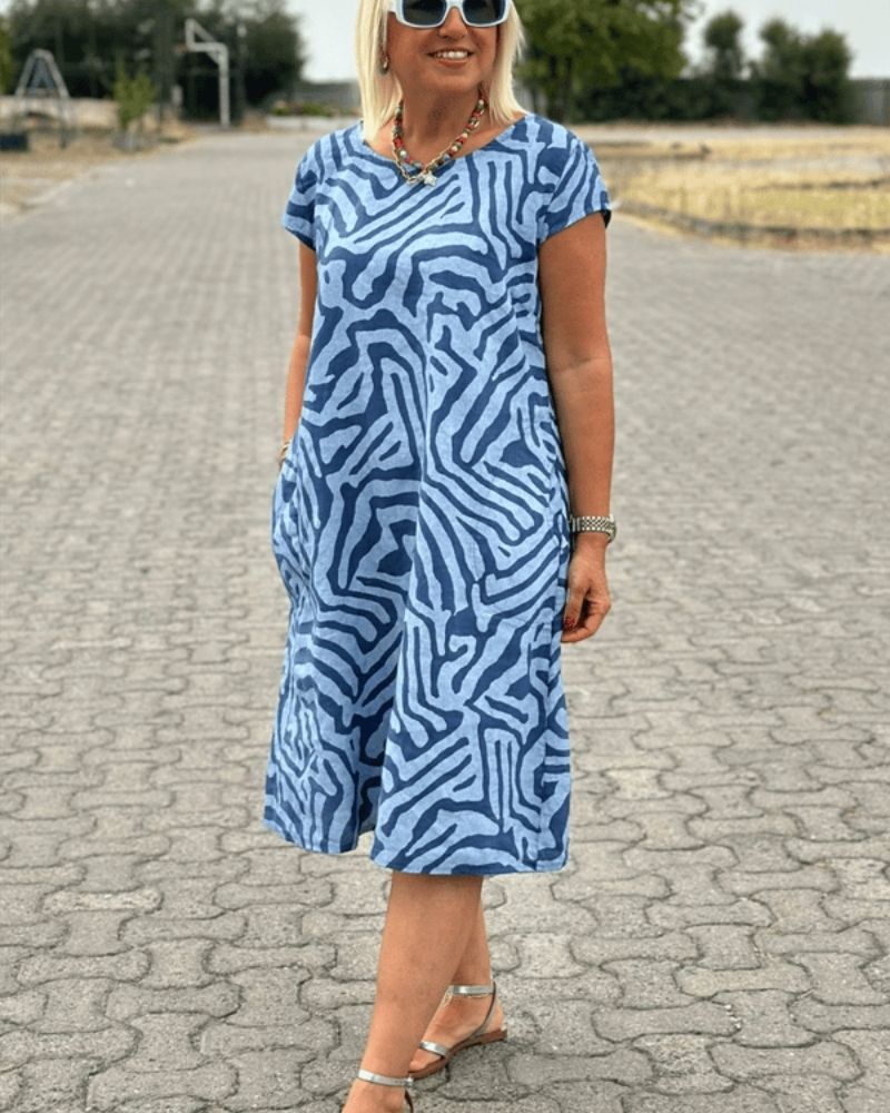 Nelia™ | Summer dress with round neckline and beautiful print